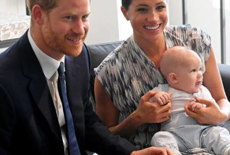 Prince Harry with his wife Meghan Markle and their son